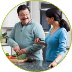 Man and woman preparing a healthy meal and controlling portions